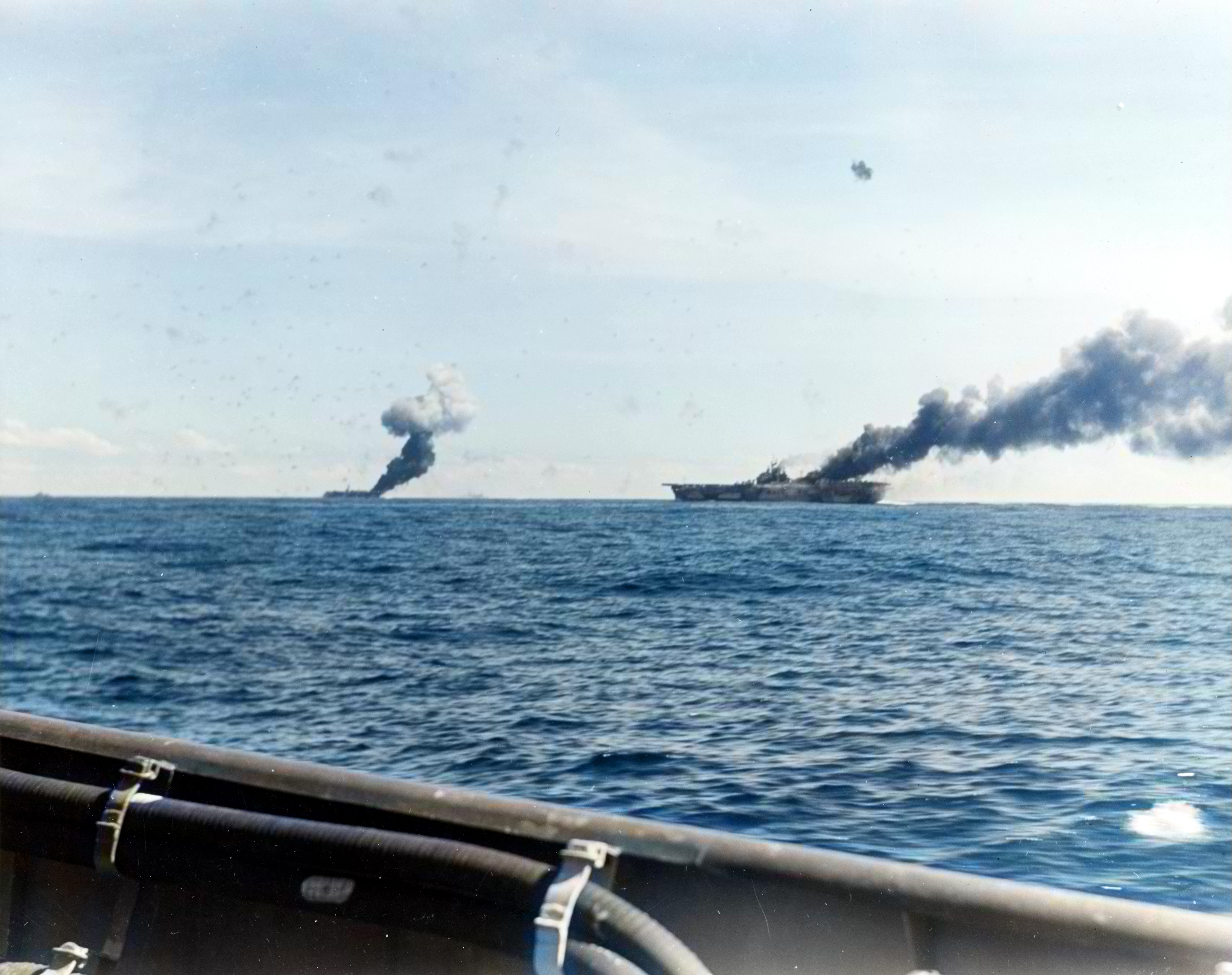 USS Franklin (CV-13) and USS Belleau Wood (CVL-24) both hit by a Japanese Kamikazes operating off Philippines 30th Oct 1945 80 G 326798