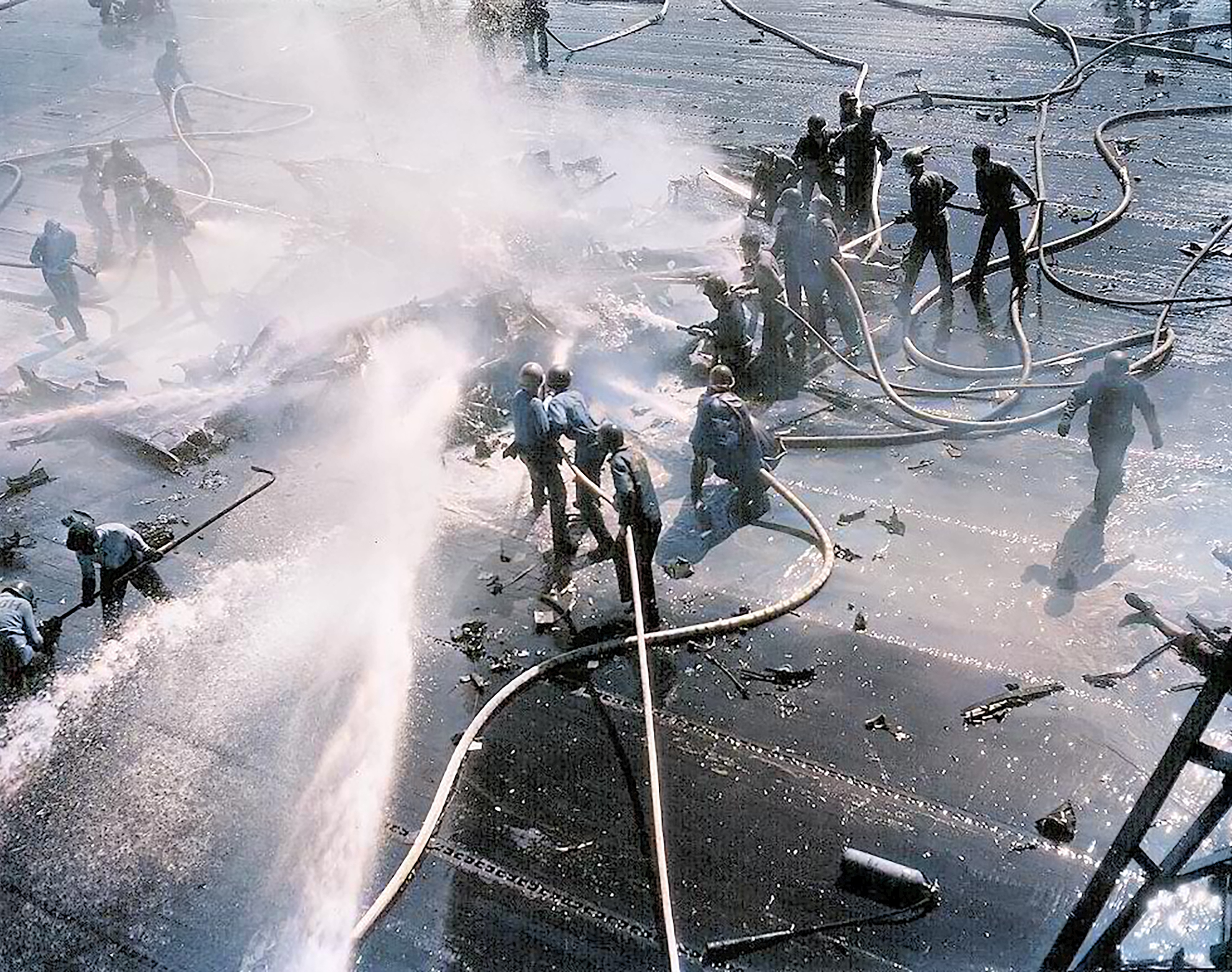 Asisbiz USS Hancock (CV-19) battle fires on the flight deck after a kamikaze attack 01