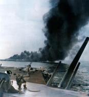 Asisbiz USS Hancock (CV 19) pictured after being hit by a kamikaze aircraft off Okinawa 7th Apr 1945 04