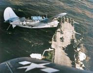 Asisbiz Curtiss SB2C 3 Helldivers over the USS Hornet II (CV 12) after strikes on Japanese shipping China Sea Jan 1945 80 G 469319