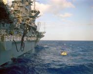 Asisbiz The Gemini 3 spacecraft alongside USS Intrepid (CVS 11) during recovery operations 23rd March 1965