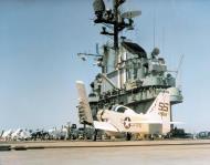 Asisbiz USS Intrepid (CVA 11) AD 6 Skyraider of (VC 33) landing aboard on 22nd June 1956 K 20591