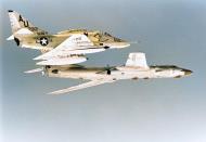 Asisbiz USS Intrepid (CVS 11) A4E Skyhawk VA 45 BulNo 152012 escorts a Soviet Naval Air Force TU 16 Badger Recce plane 1970 NH 82276
