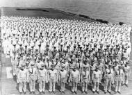 Asisbiz USS Manila Bay (CVE 61) Ship's crew on the flight deck 1945 NH 82762