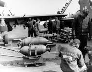 Asisbiz Philippine Sea (CV 47) 250 pound bombs being loaded on a Douglas AD Skyraider AS 65 off the Korean coast 21st May 1951 80 G 439902