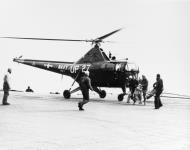 Asisbiz Sikorsky HO3S 1 helicopter HU 1 UP27 BulNo 122715 returns after rescuing sortie off the coast of Korea 27th Jan 1951 80 G 439847