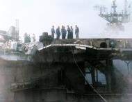 Asisbiz USS Princeton (CVL 23) seen from USS Birmingham (CL 62) during attempts to control her fires 24th Oct 1944 80 G 270375