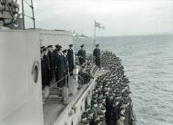 Asisbiz Rear Admiral Burnett and Captain Parham on 'X' gun deck of HMS Belfast as planes return to USS Ranger 4th Oct 1943 IWM A19620