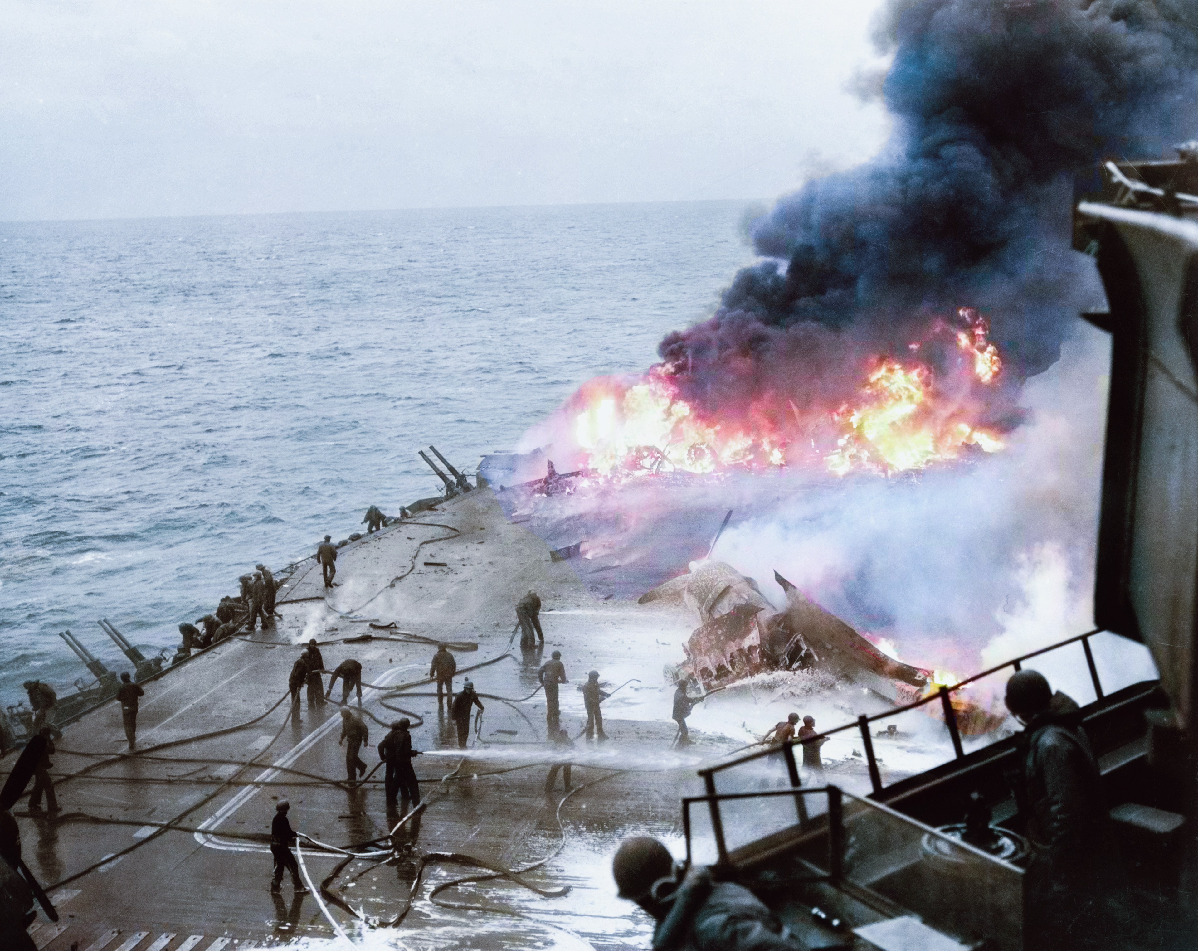 USS Saratoga (CV 3) forward flight deck on fire hit by several Kamikazes off Iwo Jima 21st Feb 1945 80 G 273631