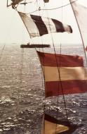 Asisbiz USS Kasaan Bay (CVE 69) seen through signal flags of USS Tulagi (CVE 72) off S France Operation Dragoon D Day 15th Aug 1944 80 G K 15369